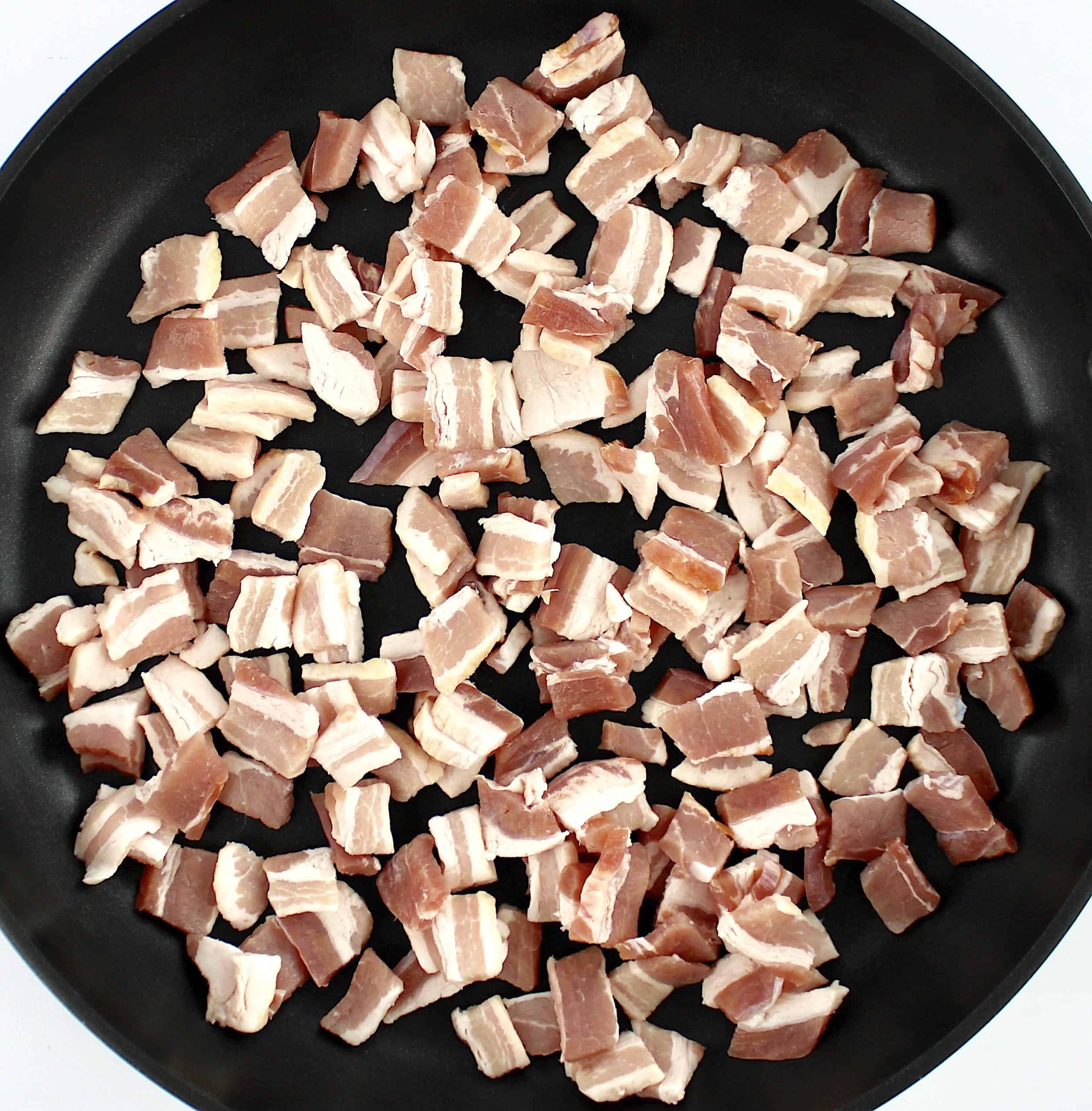 chopped raw bacon in skillet
