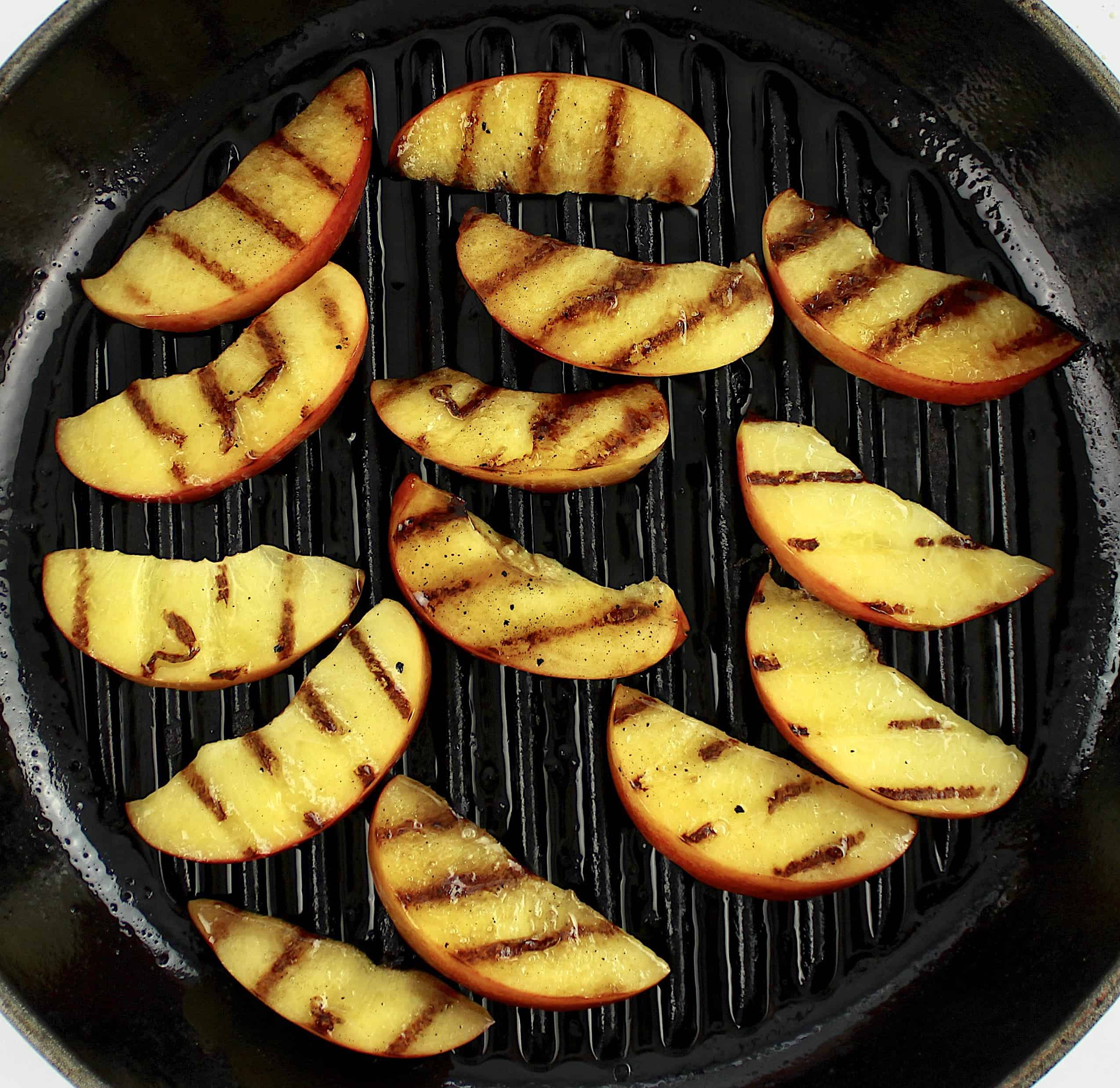 grilled peach slices in grill pan