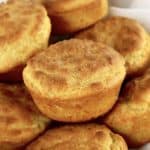 Keto Biscuits piled up in bowl with white napkin