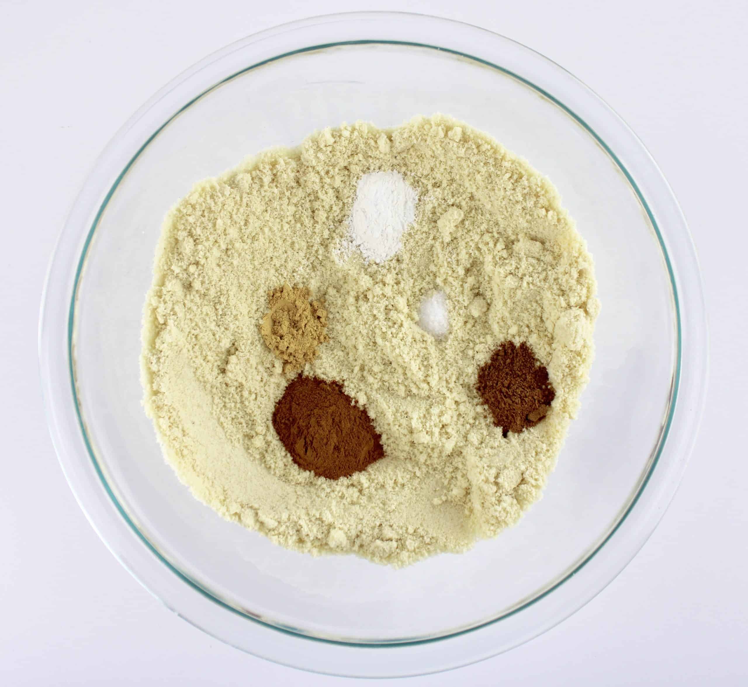 almond flour and spices in glass bowl unmixed