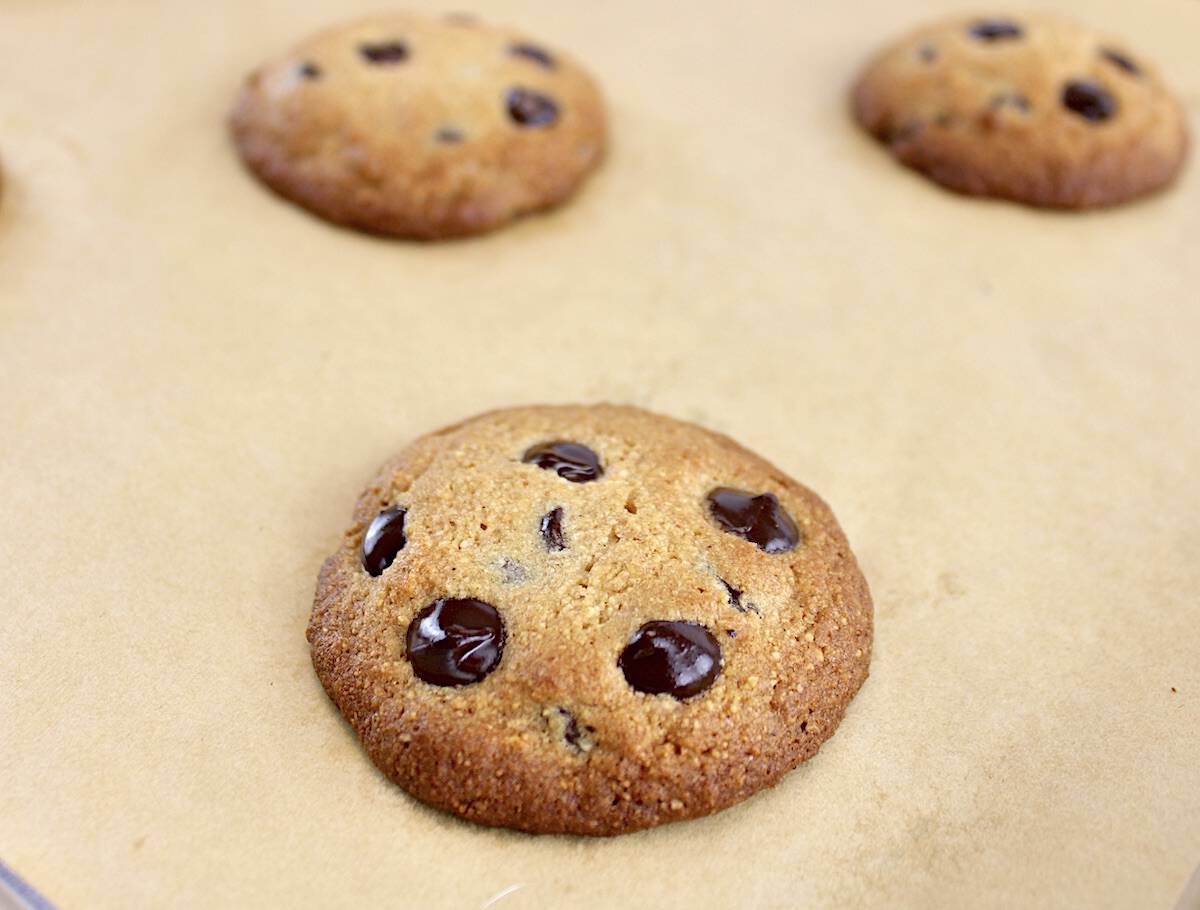 Keto Chocolate Chip Cookies on parchment paper