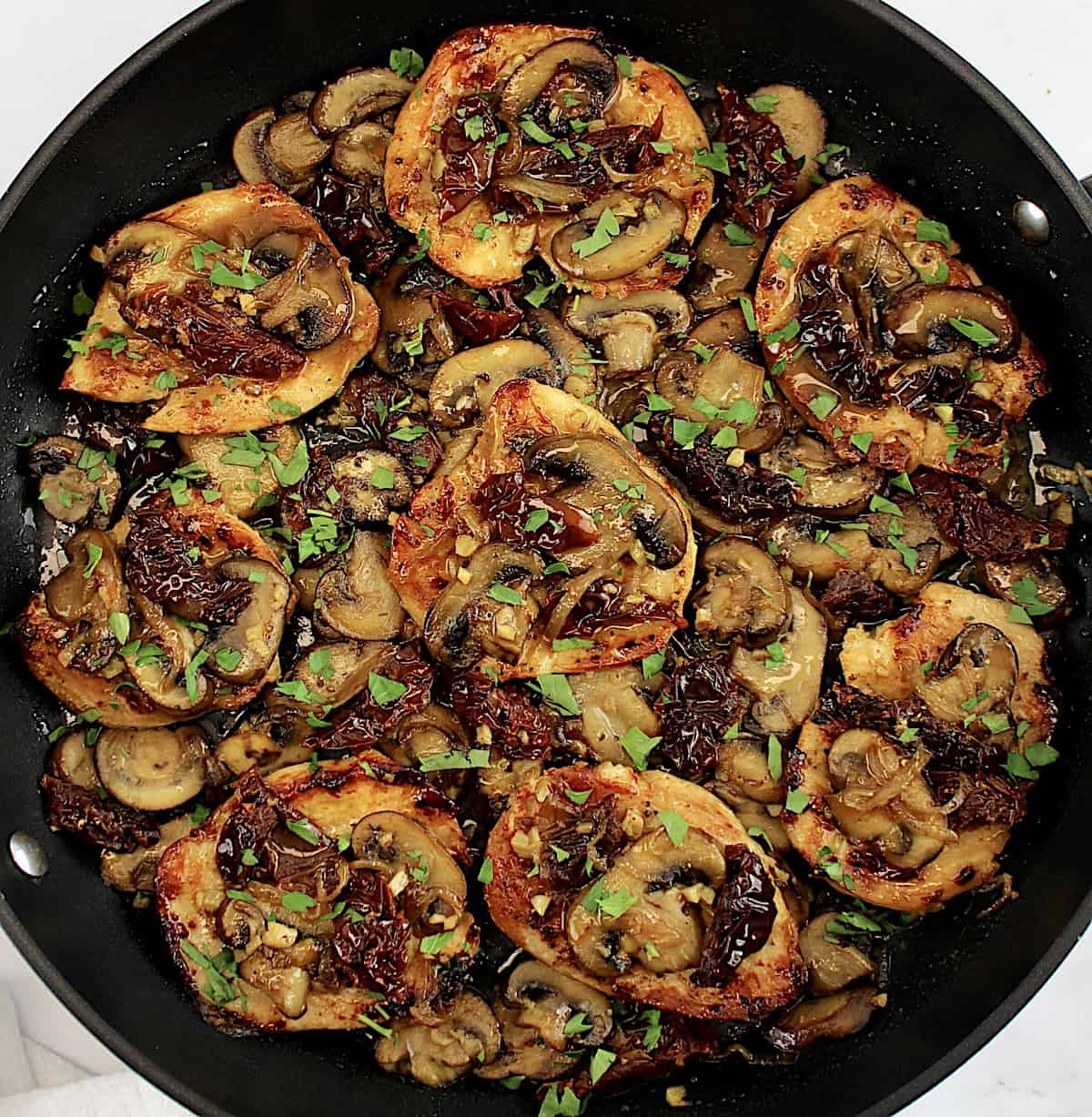 Mushroom Chicken with Sun-Dried Tomatoes in skillet
