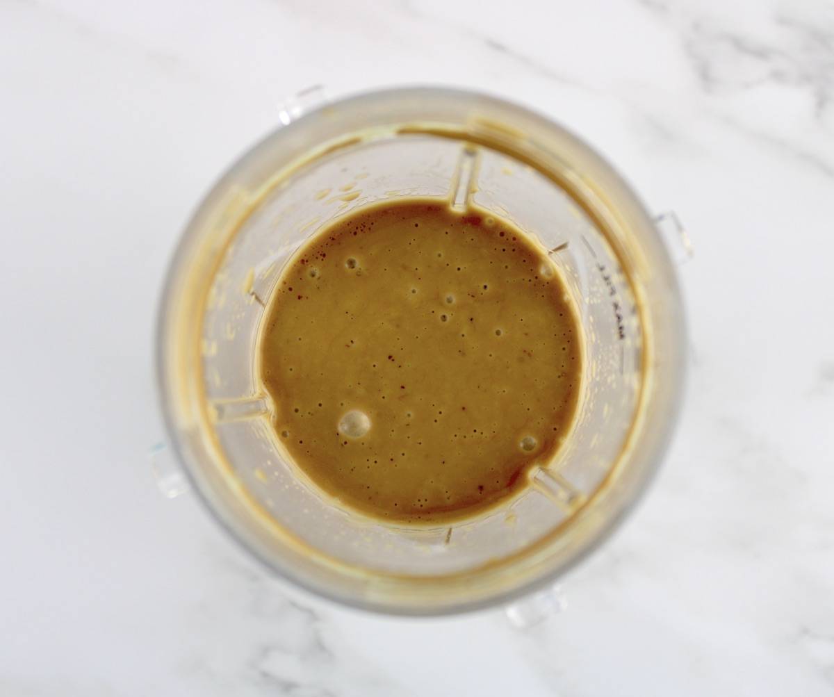 overhead view of Creamy Balsamic Dressing in bullet blender cup
