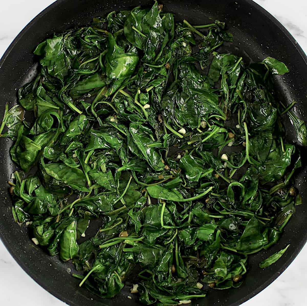 sauteed spinach in skillet