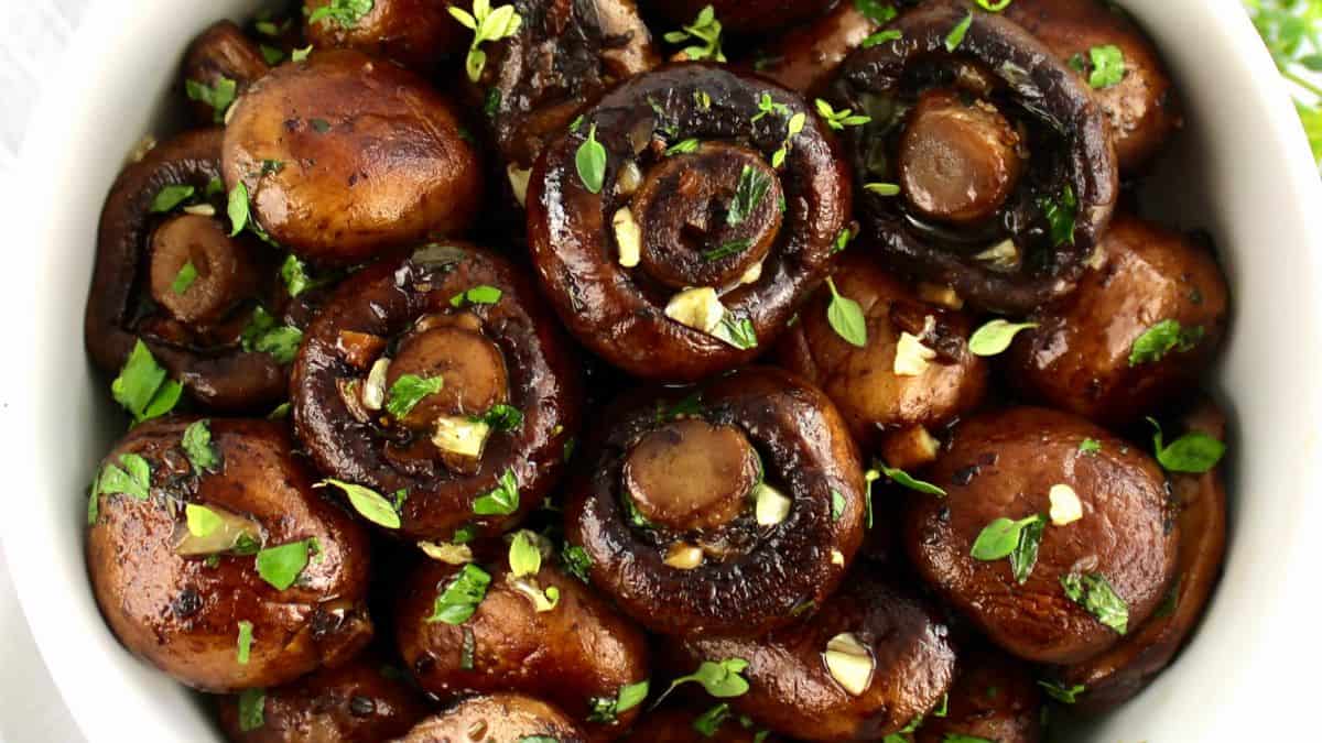 closeup Sauteed Mushrooms with garlic and chopped parsley