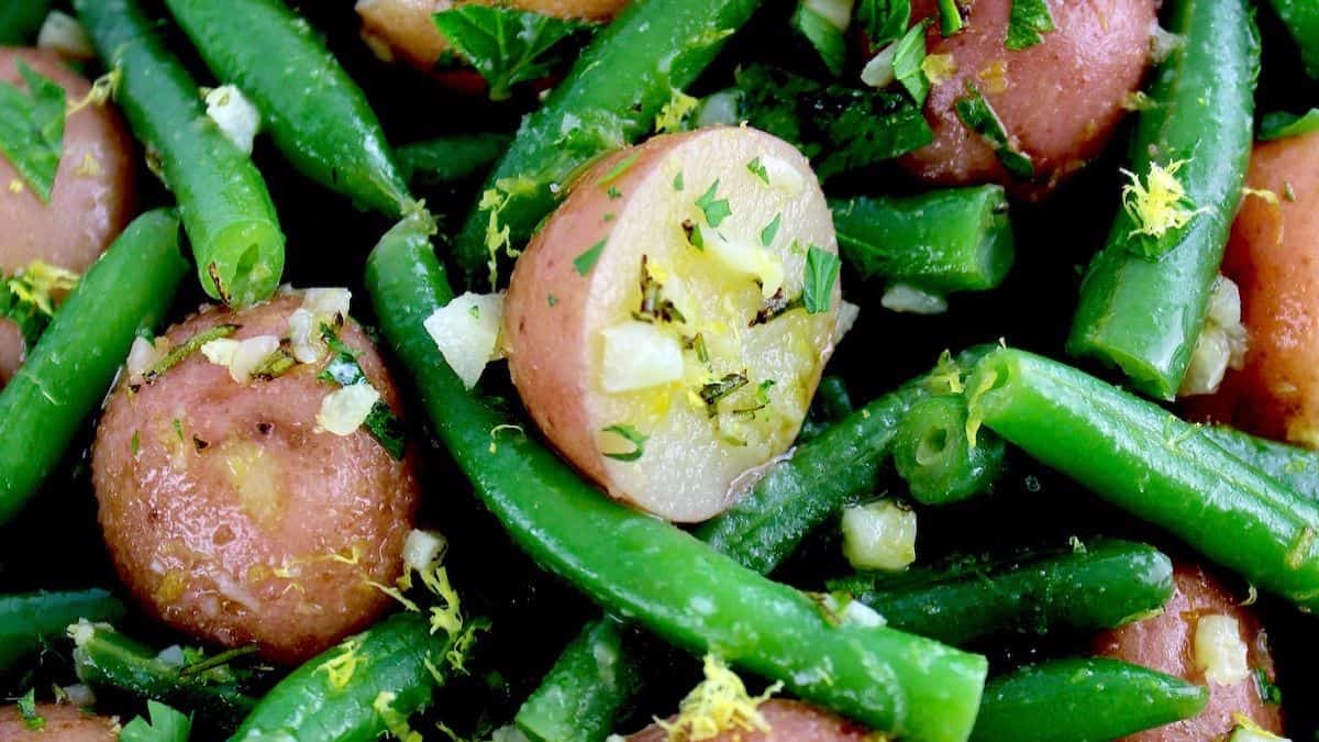 closeup of Green Beans and Potatoes with parsley and lemon