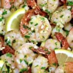 closeup of Air Fryer Shrimp Scampi with lemon slices and chopped parsley