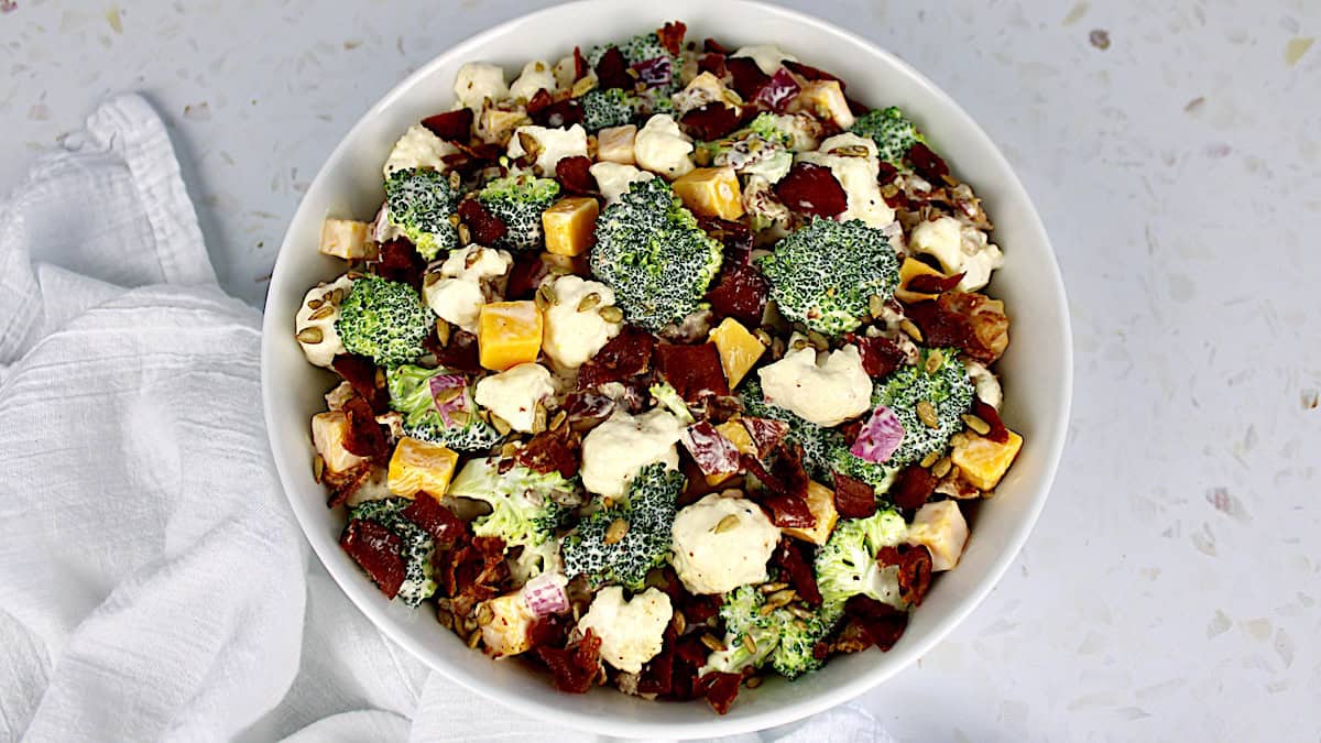 Broccoli Cauliflower Salad in white bowl