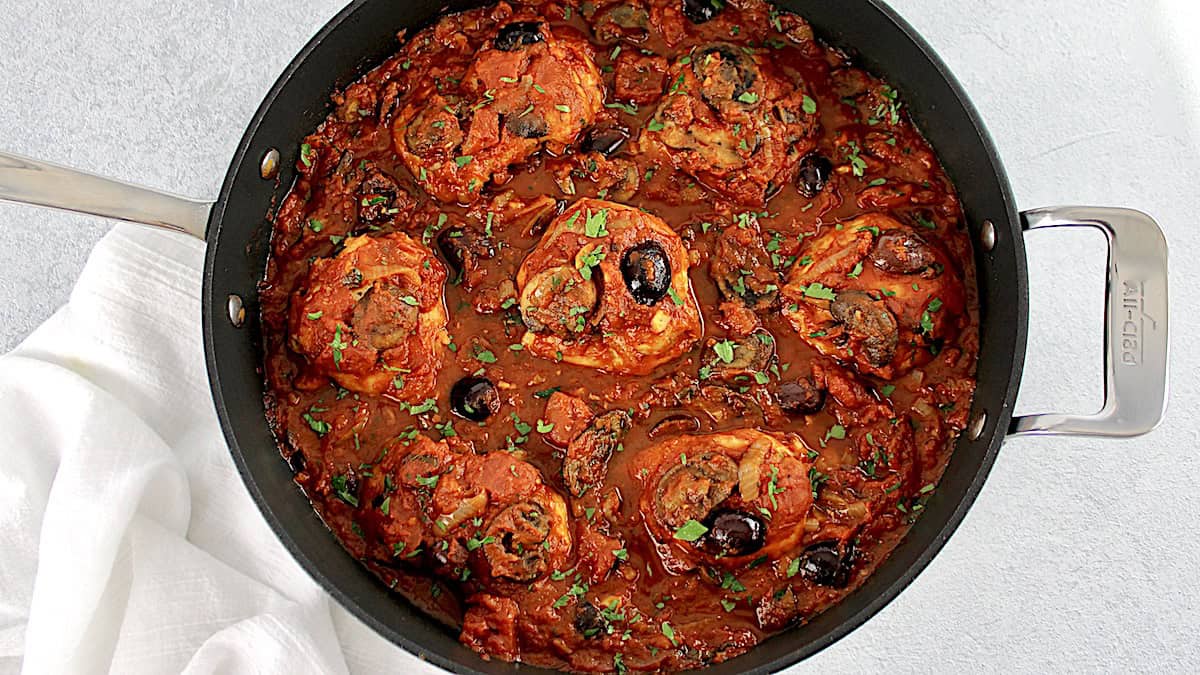 overhead view of Chicken Cacciatore in skillet