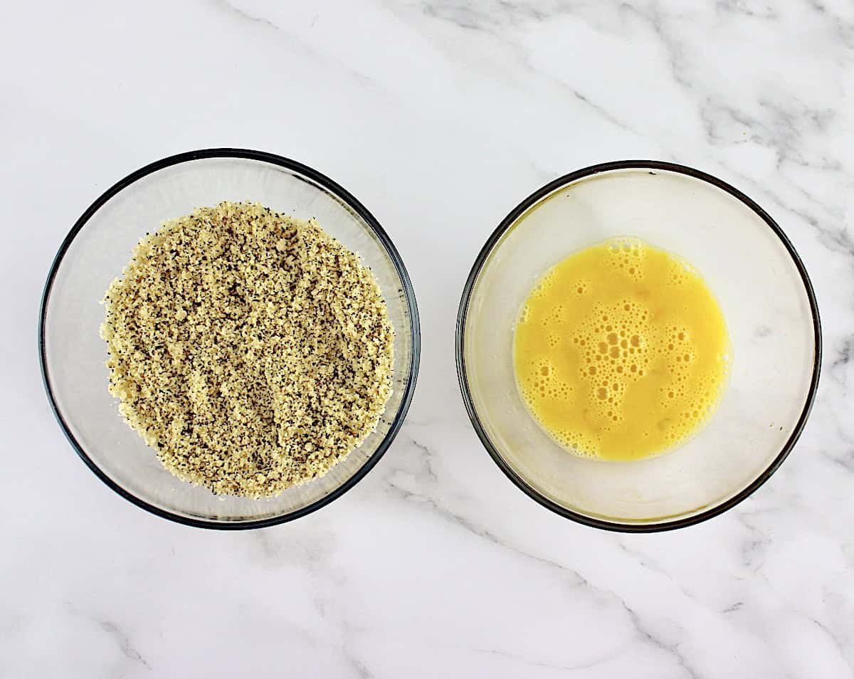 keto breading in glass bowl and beaten egg in second glass bowl