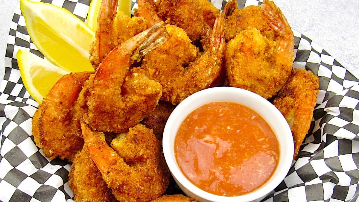 Keto Fried Shrimp in basket with cocktail sauce in white bowl