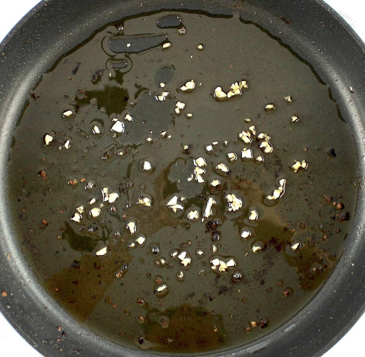 minced garlic in skillet