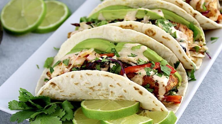 closeup of Mahi Mahi Tacos in white plate