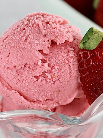 Strawberry Frozen Yogurt in glass with strawberry on top