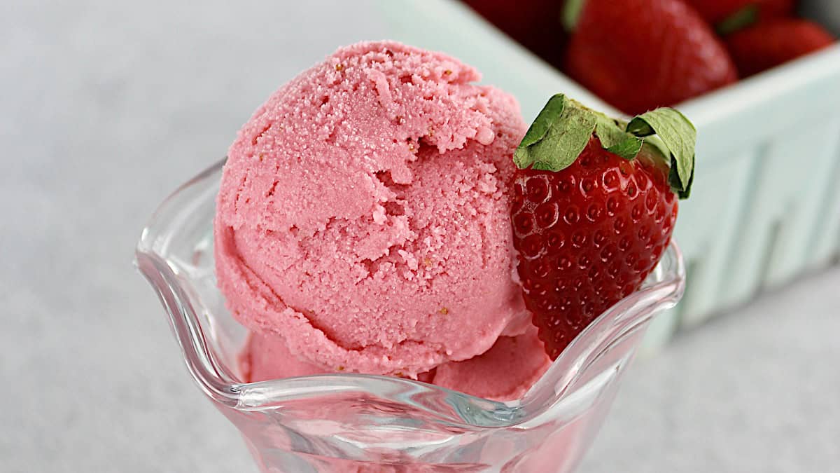 Strawberry Frozen Yogurt in glass with strawberry on top