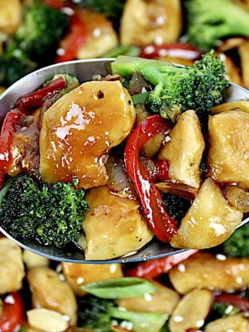 overhead closeup of Teriyaki Chicken Stir Fry in silver serving spoon