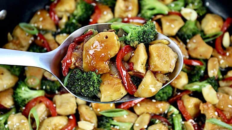 overhead closeup of Teriyaki Chicken Stir Fry in silver serving spoon