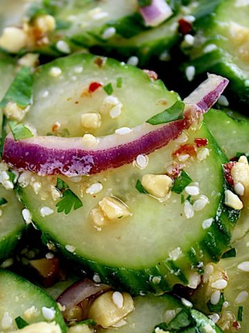 closeup of Thai Cucumber Salad with chopped peanuts and cilantro