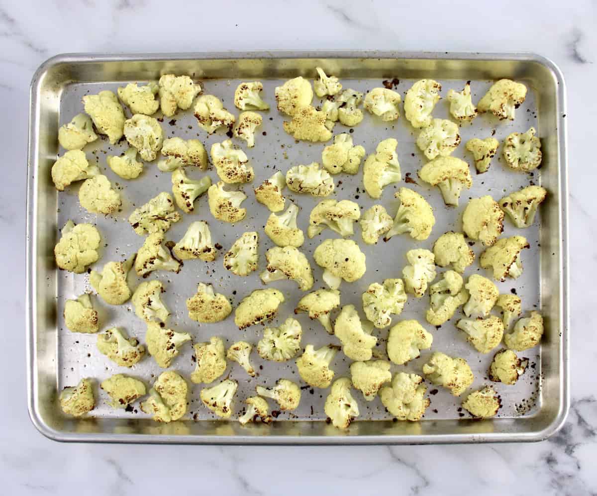 roasted cauliflower florets on baking sheet