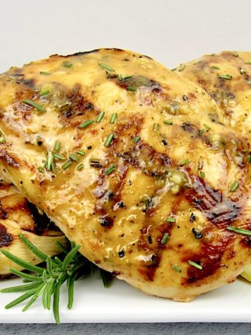 closeup of grilled chicken with citrus glaze