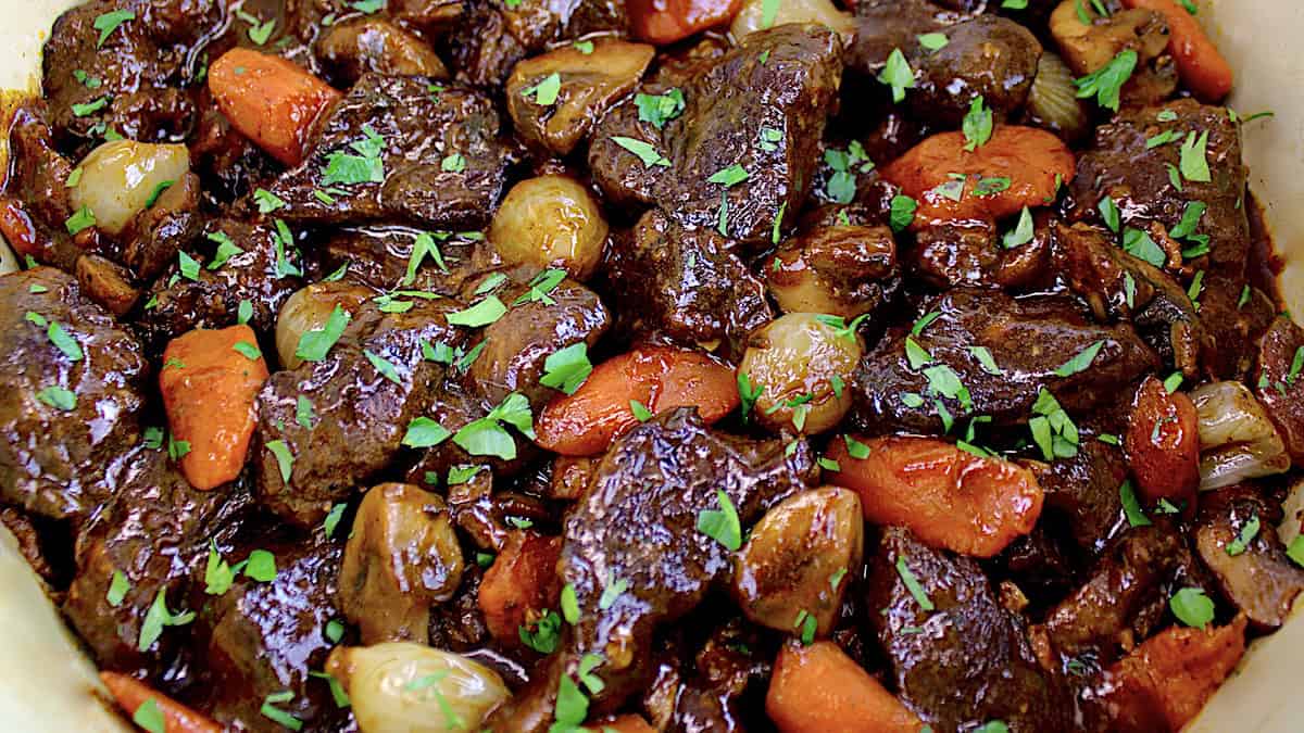 closeup of Keto Beef Bourguignon with chopped parsley on top