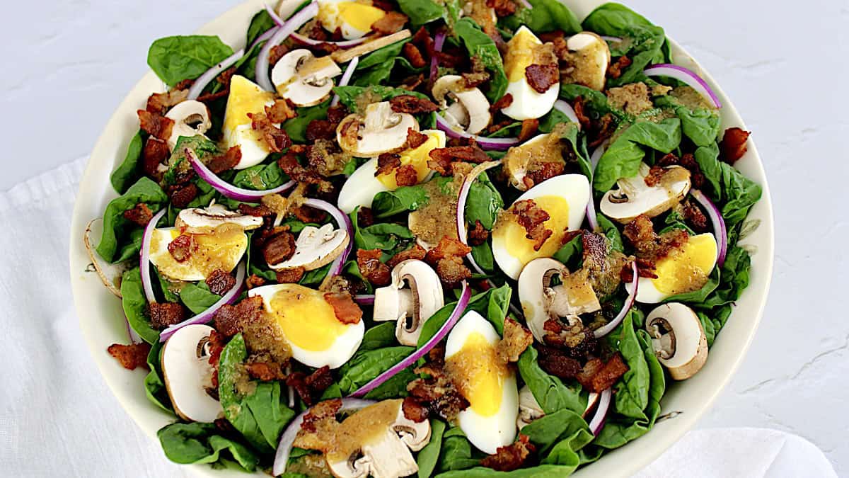 Keto Spinach Salad in white bowl