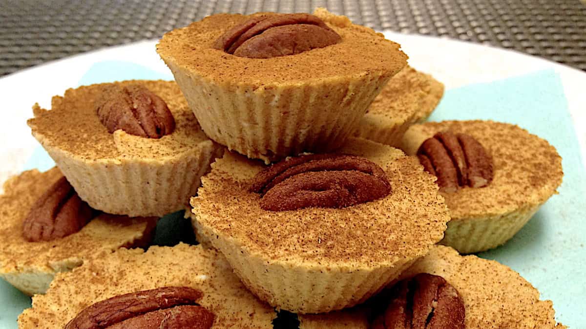 Pumpkin Pie Fat Bombs stacked up on white plate