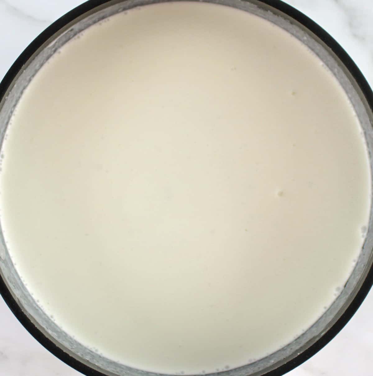 coconut milk and cream in saucepan