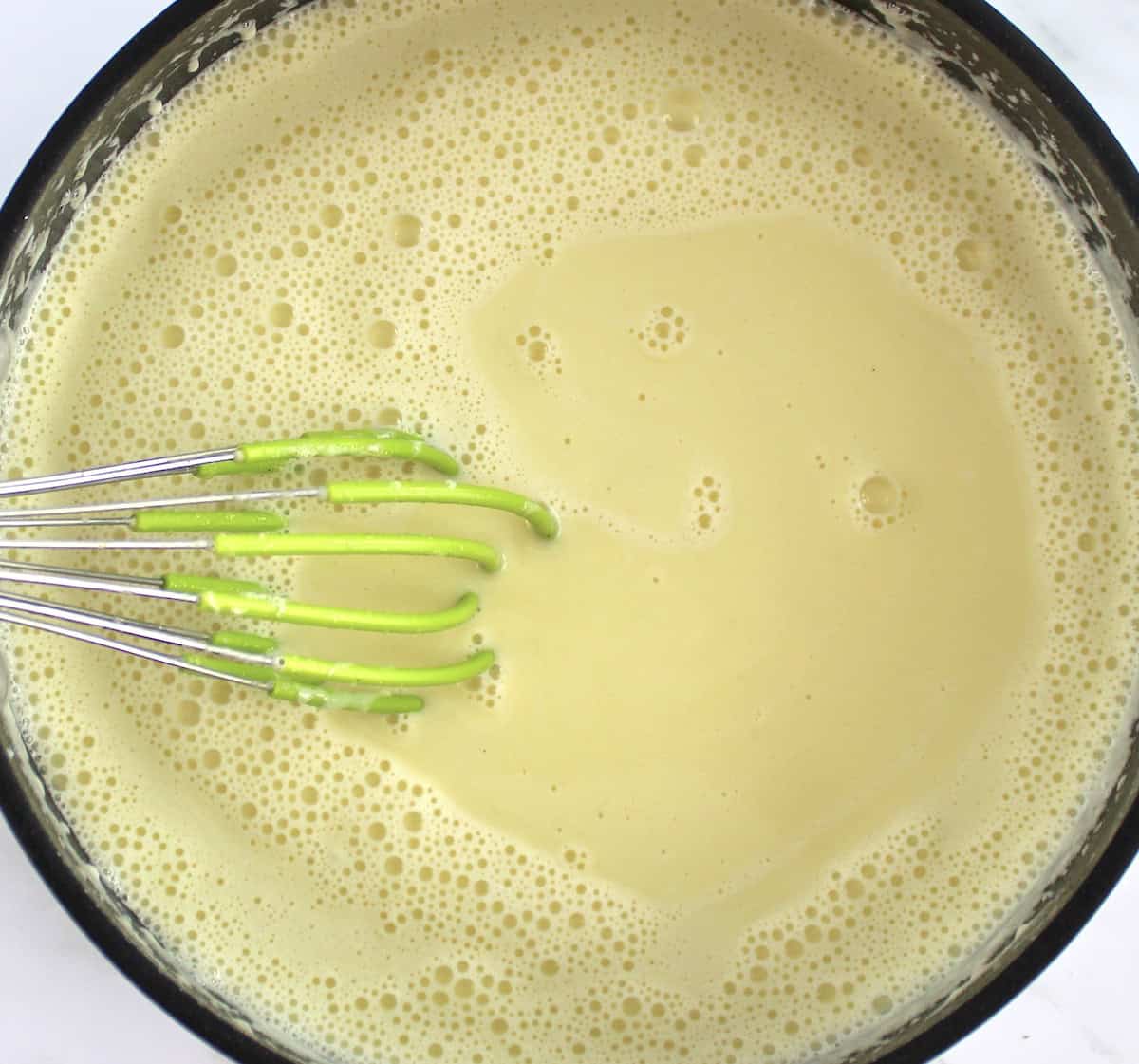 Sugar Free Keto Custard being whisked in saucepan