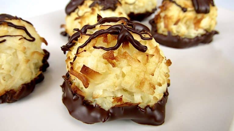coconut macaroons with chocolate drizzled on top