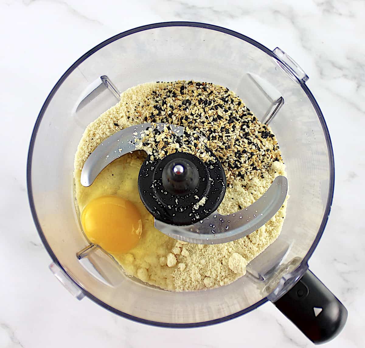 Everything Bagel Crackers dough ingredients in food processor bowl unmixed
