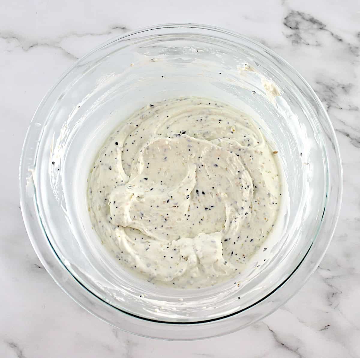 Everything Bagel Dip in glass bowl