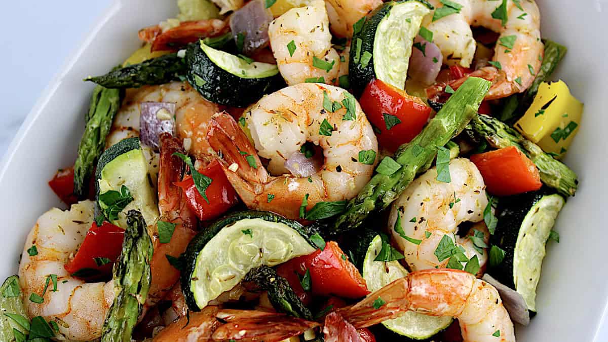 closeup of Sheet Pan Shrimp and Veggies with chopped parsley