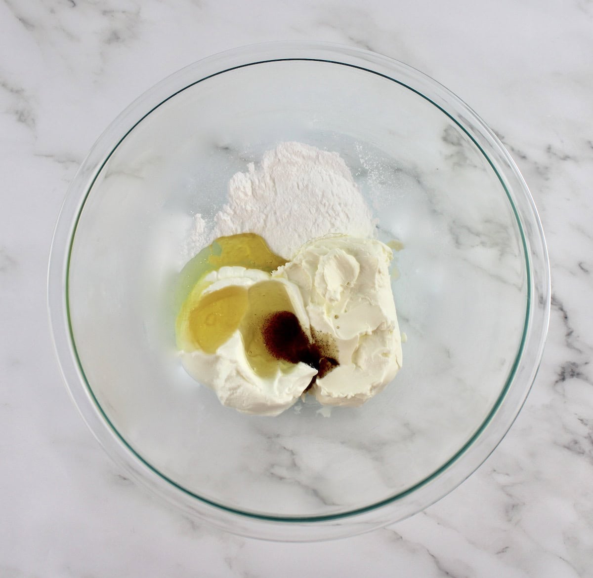 Easy Fruit Dip ingredients in glass bowl unmixed