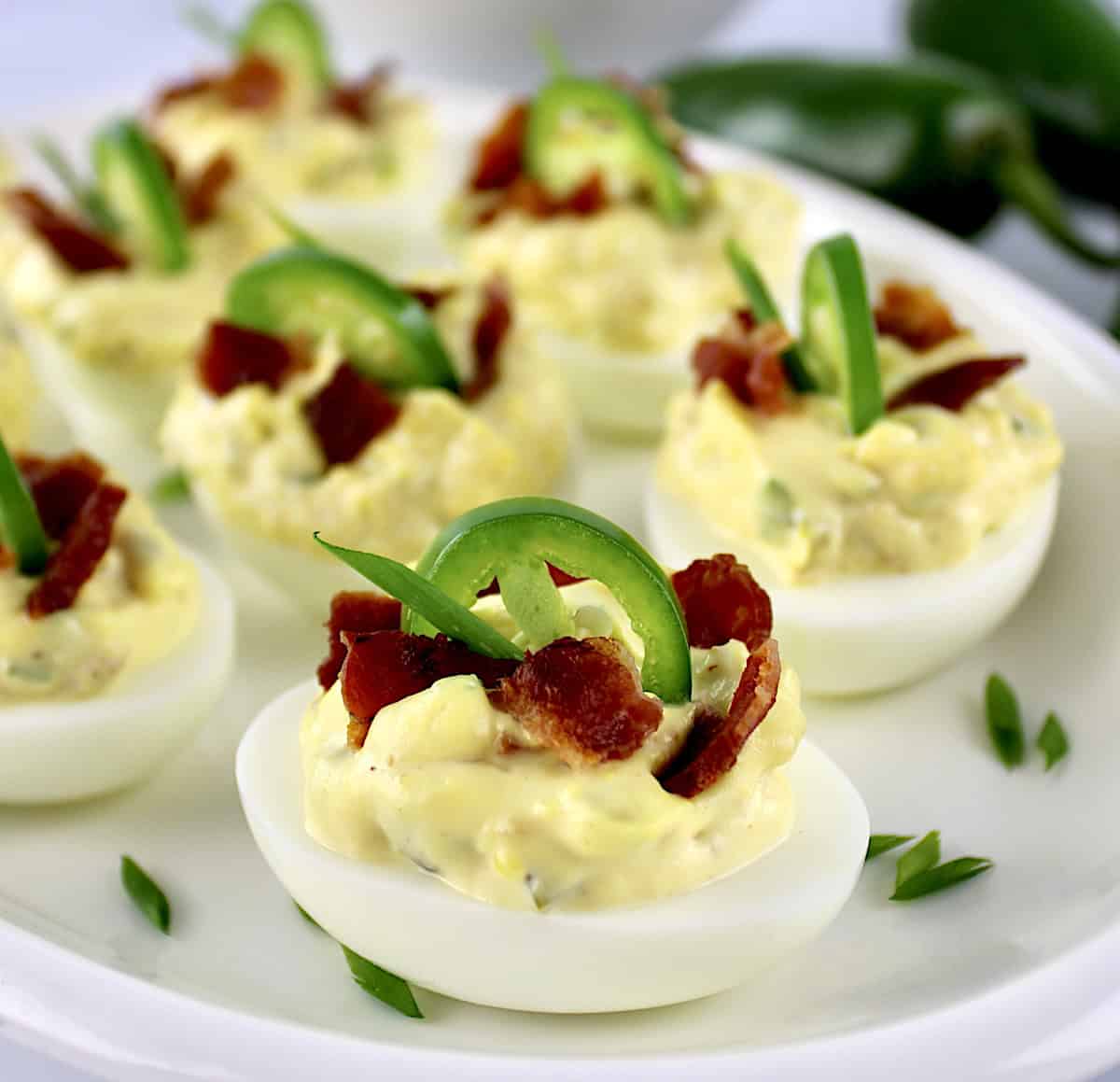 closeup of Jalapeño Popper Deviled Eggs on white platter