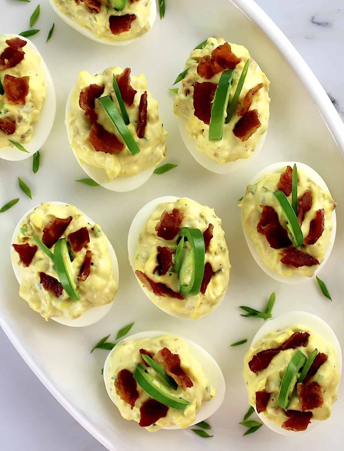 overhead view of Jalapeño Popper Deviled Eggs on white oval platter