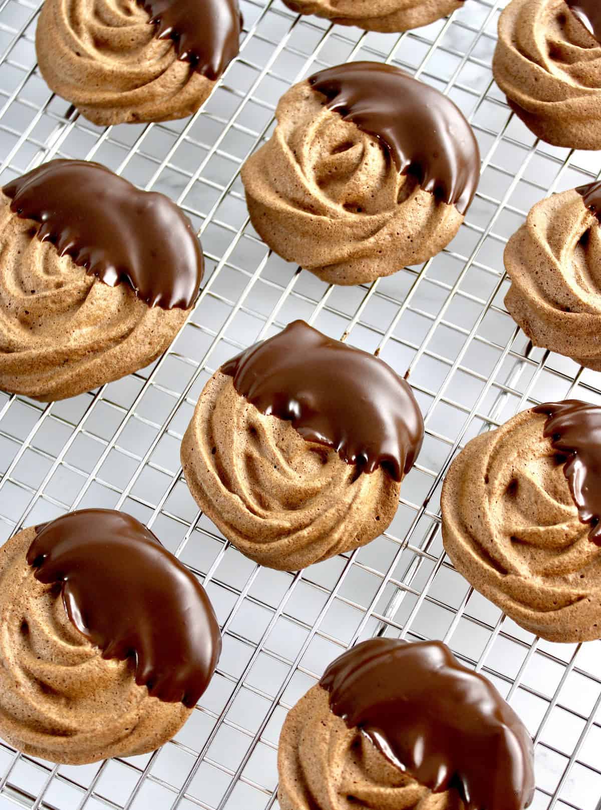 chocolate dipped Mocha Meringue Cookies on cooling rack