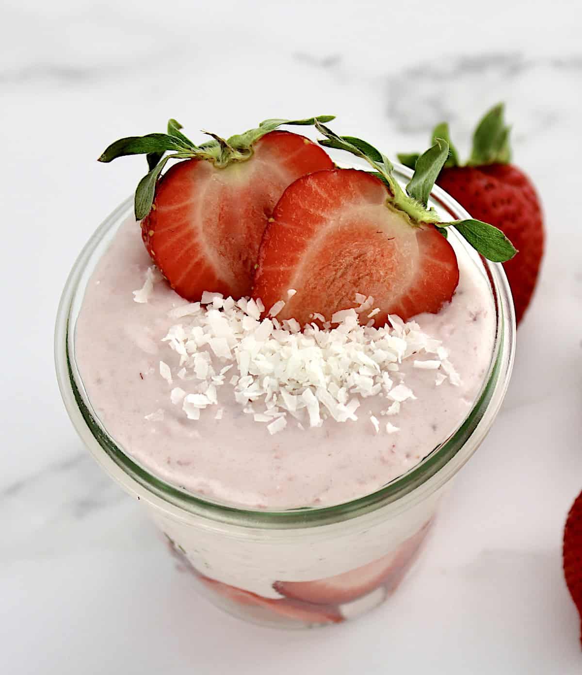 overhead view of Strawberry Coconut Cream Mousse in glass jar