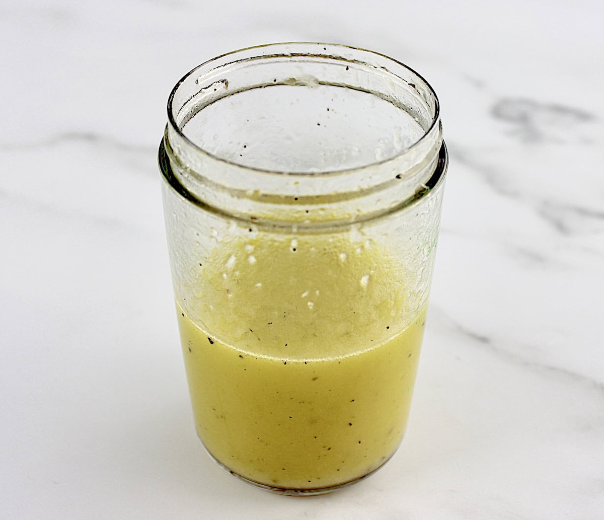 Israeli Salad dressing in dressing shaker cup