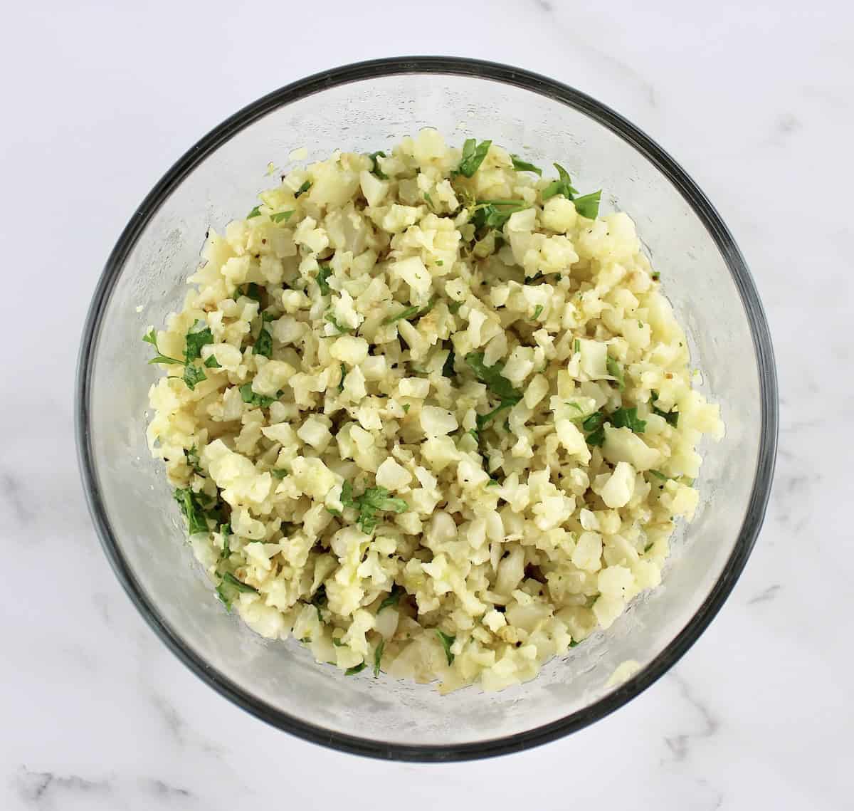 lime cilantro cauliflower rice in glass bowl