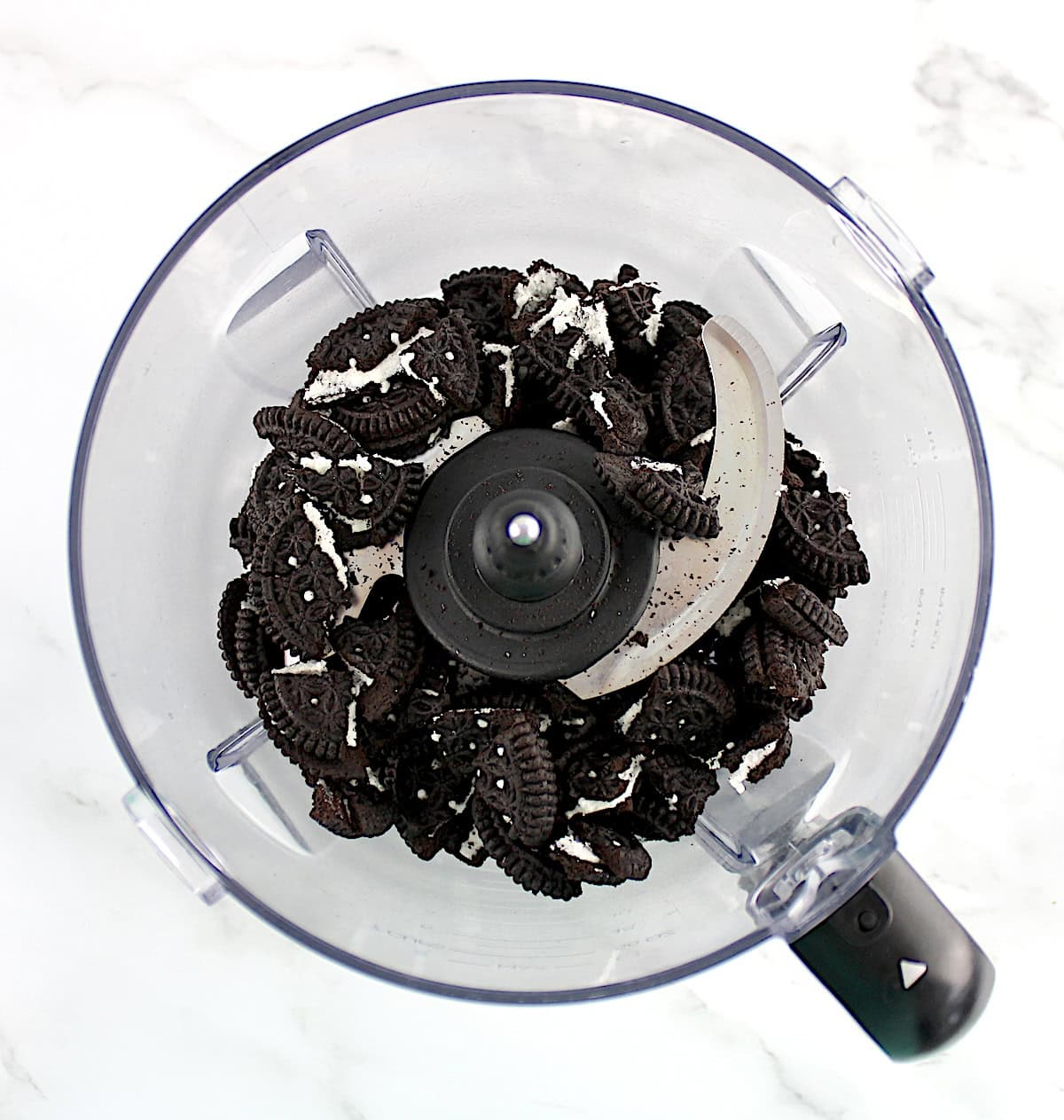 broken keto oreos in food processor bowl