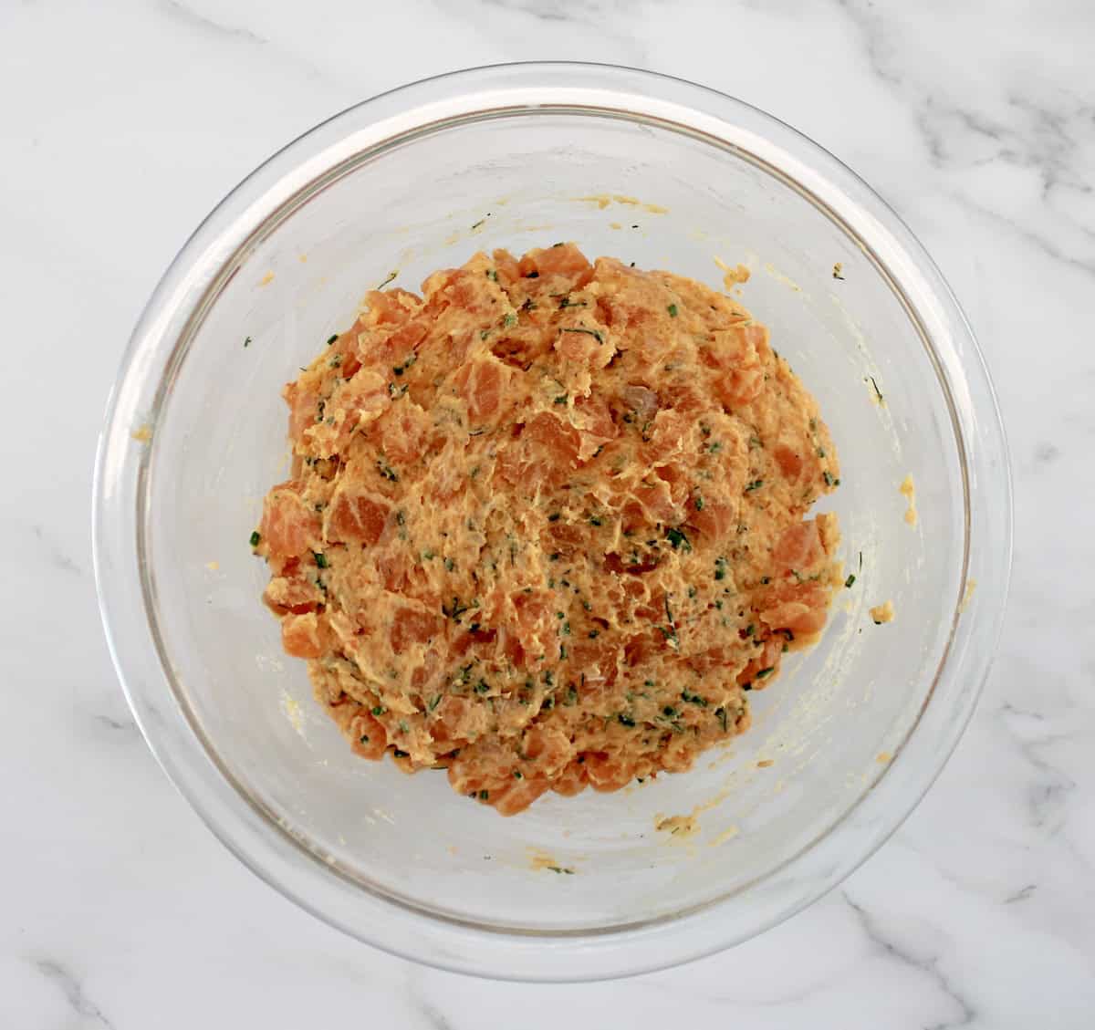 Boom Boom Salmon Burger raw in glass bowl