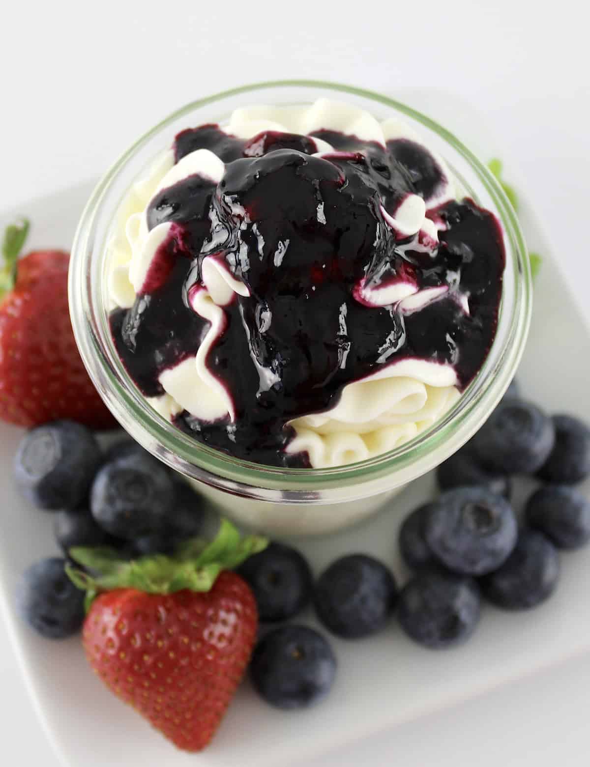 Keto Blueberry Sauce over cheesecake fluff in glass jar