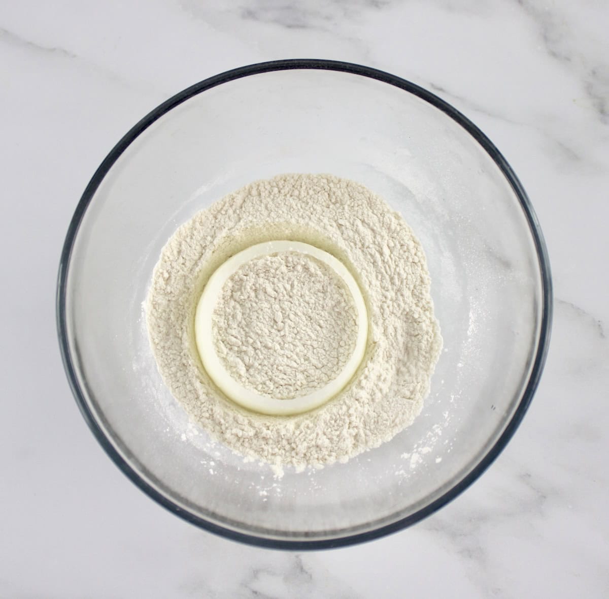 onion slice in oat fiber in glass bowl