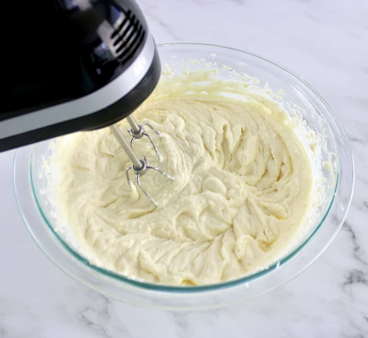 Cannoli Dip being whipped with hand mixer