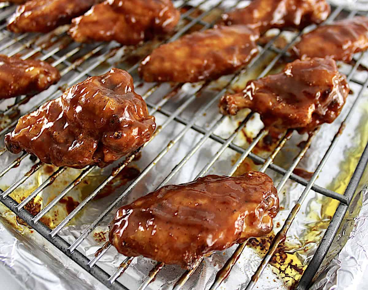 closeup of Honey BBQ Chicken Wings on wire baking rack