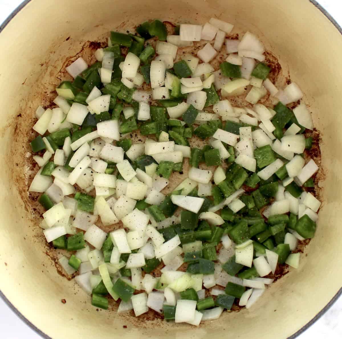 diced onions and jalapeno peppers in pot