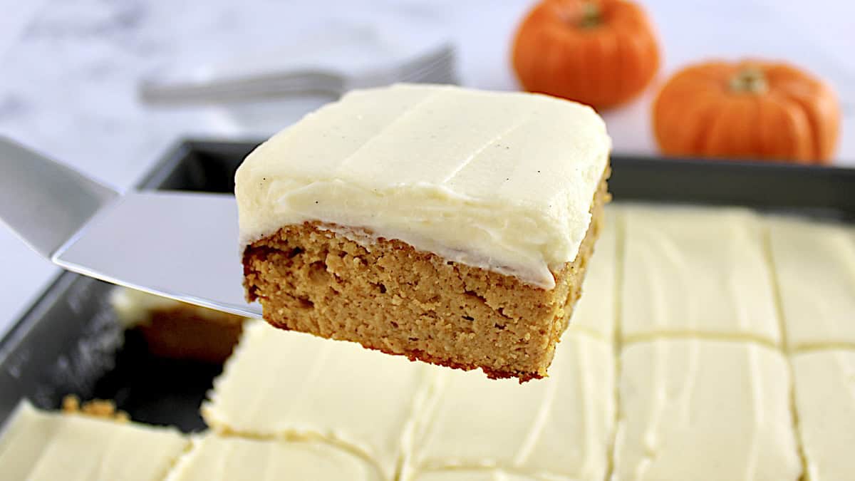 slice of Pumpkin Spice Cake held up with spatula