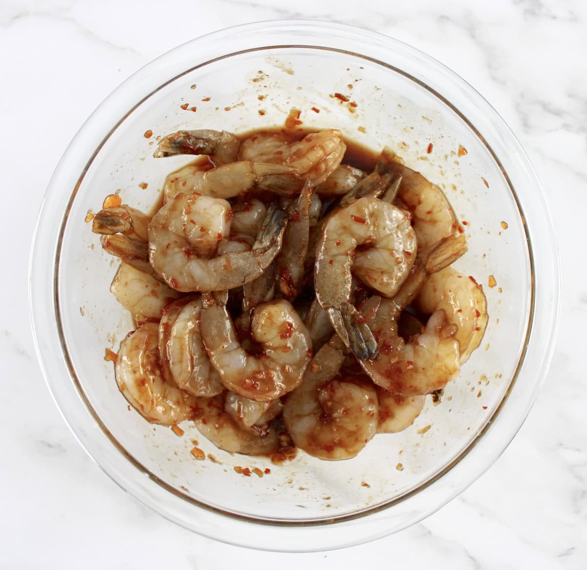 Air Fryer Asian Shrimp marinating in glass bowl