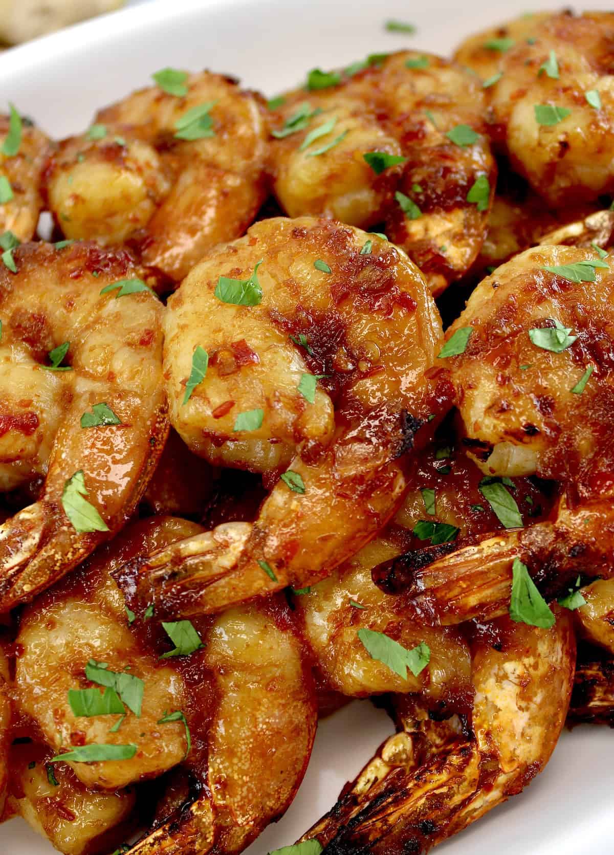 closeup of Air Fryer Asian Shrimp Skewers with chopped parsley